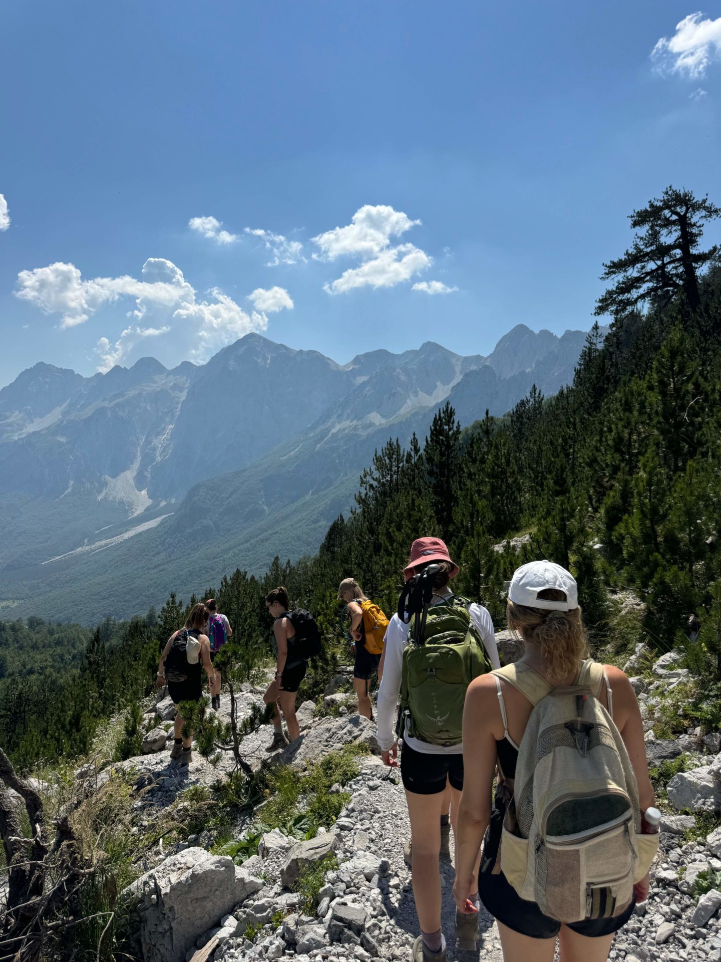 A group of women hiking down a mountain in Albania