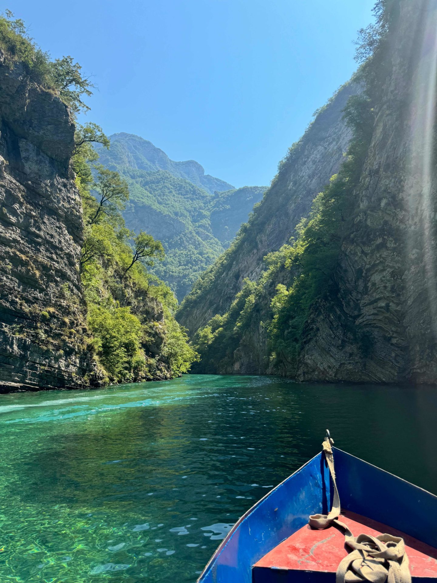 The tip of a boat on a lake in Albania